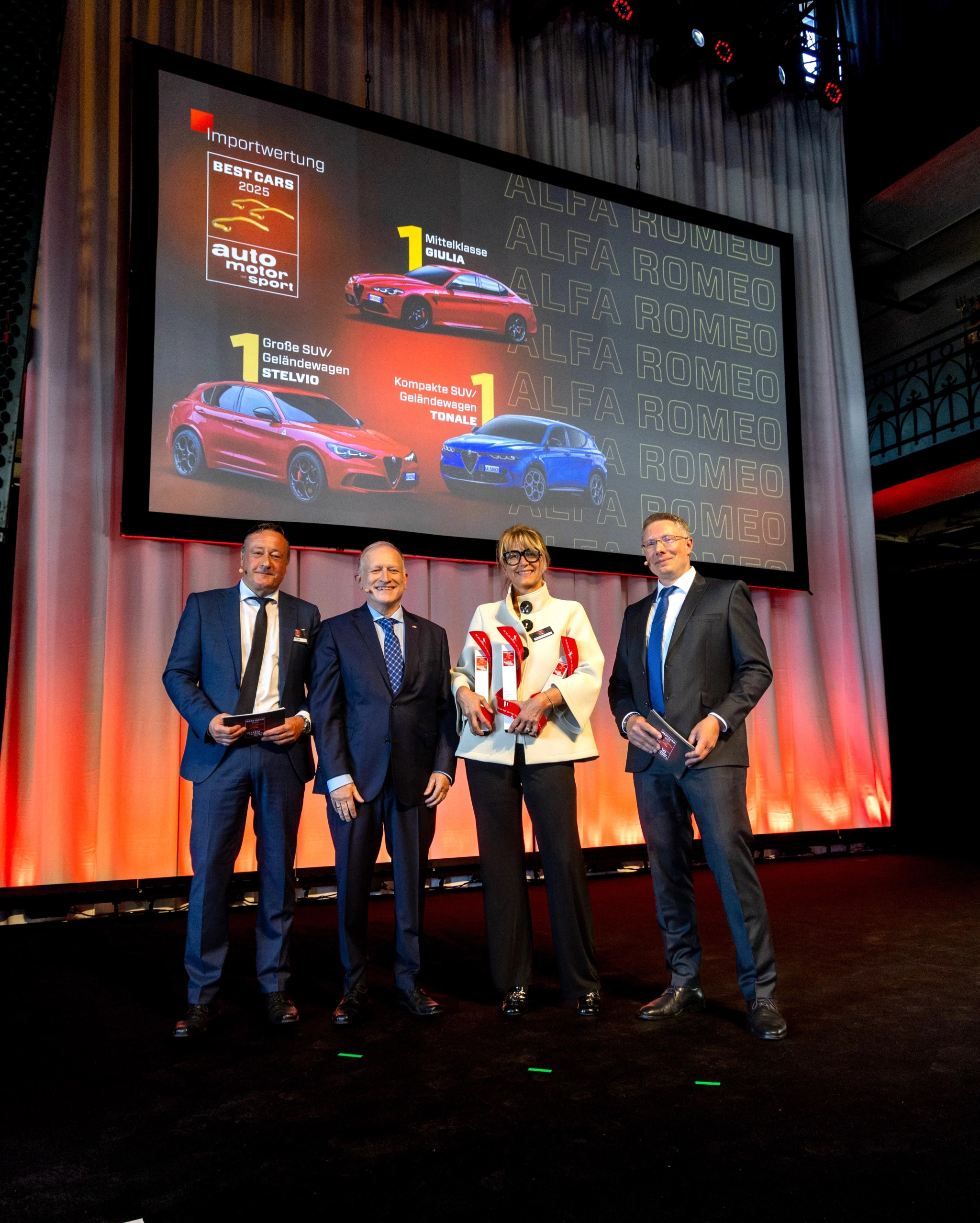 SimonettaCerrutiHeadofAlfaRomeoEnlargedEuropareceivingtheawardbyAutoMotorundSportmagazine