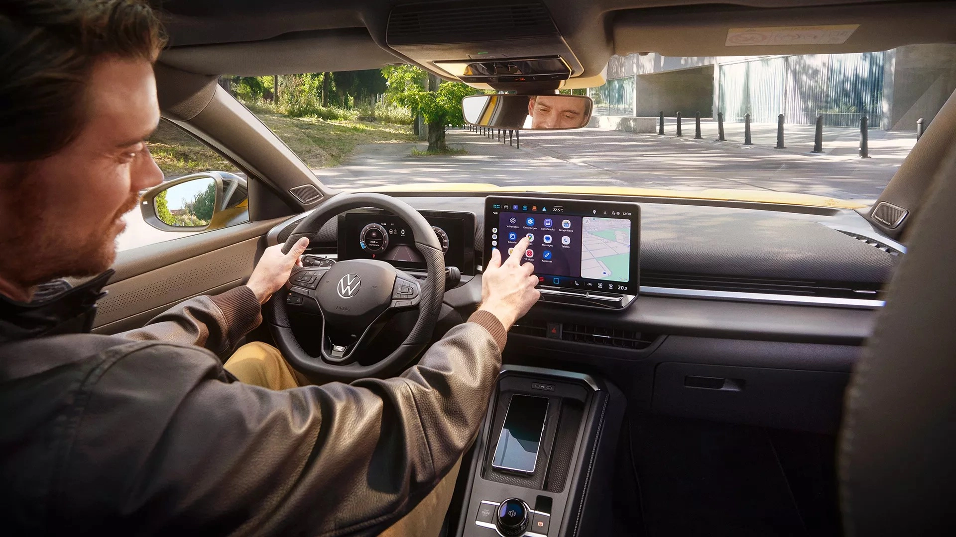 TC1287 T roc Interior Man Using Apple Carplay